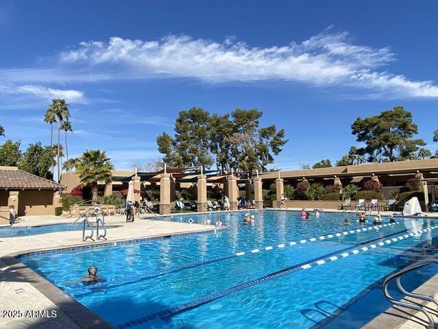 pool featuring a patio