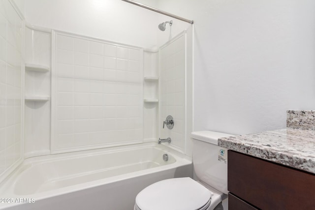 bathroom with toilet, washtub / shower combination, and vanity