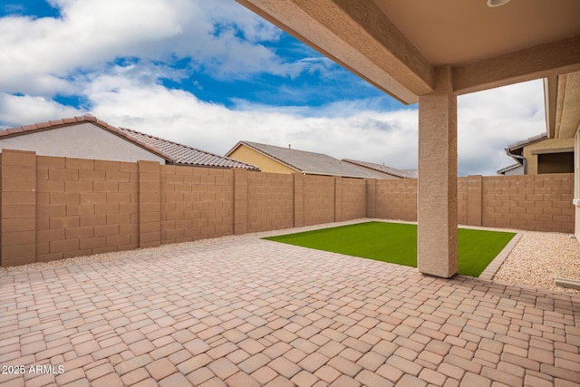 view of patio featuring a fenced backyard