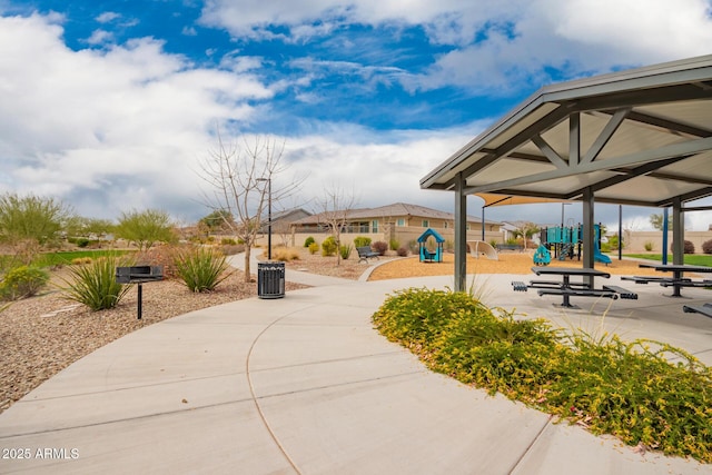 view of home's community featuring playground community