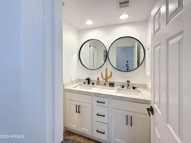 19777 N 76th St N Unit 2243, Scottsdale, AZ 85255 - bathroom with double vanity and wood finished floors