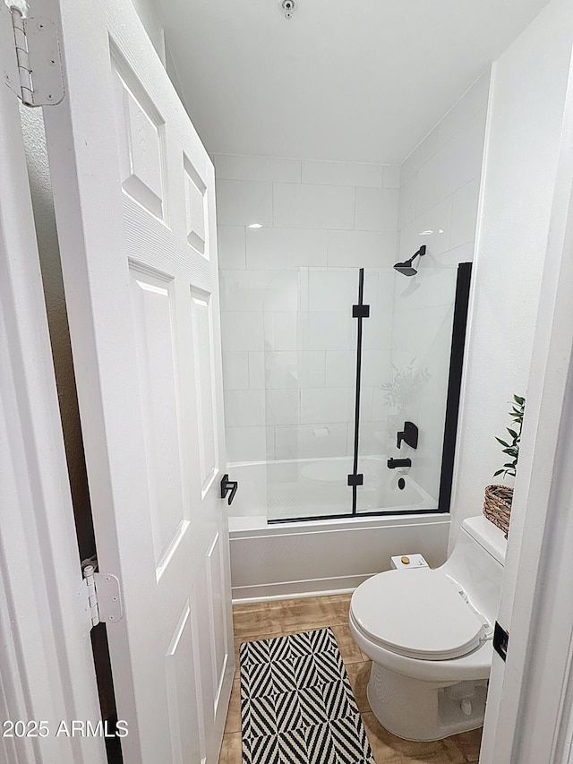 19777 N 76th St N Unit 2243, Scottsdale, AZ 85255 - full bath with toilet, combined bath / shower with glass door, and wood finished floors