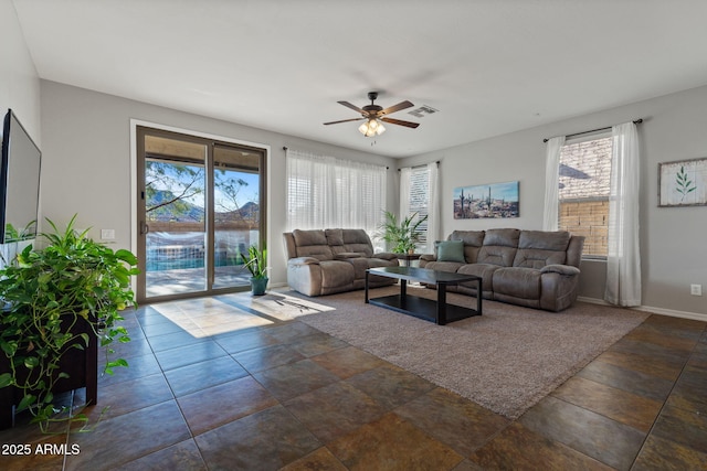 living room featuring ceiling fan