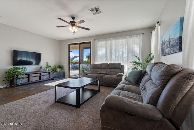 living room featuring french doors and ceiling fan