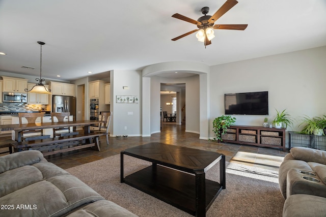 living room with ceiling fan