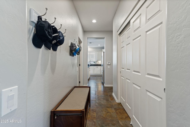 hall featuring sink