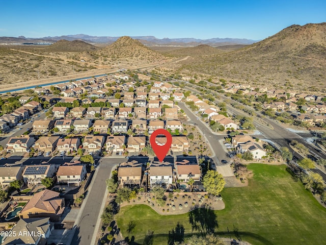 drone / aerial view featuring a mountain view