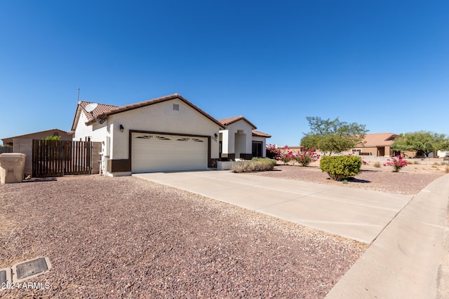 view of front of property featuring a garage