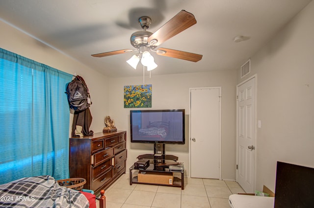 bedroom featuring ceiling fan and light tile patterned floors