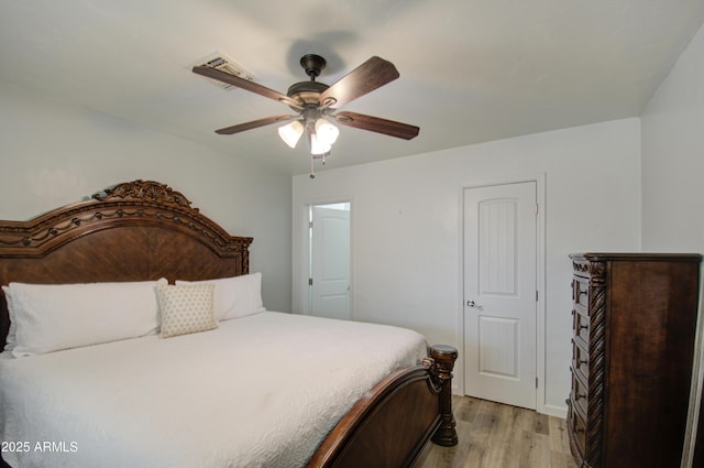 bedroom featuring ceiling fan and light hardwood / wood-style flooring