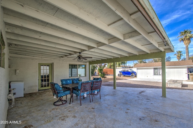 view of patio featuring ceiling fan