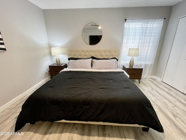 bedroom with light hardwood / wood-style flooring