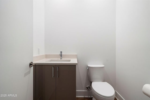 19355 N 73rd Way Unit A4004, Scottsdale, AZ 85255 - bathroom featuring vanity, baseboards, and toilet