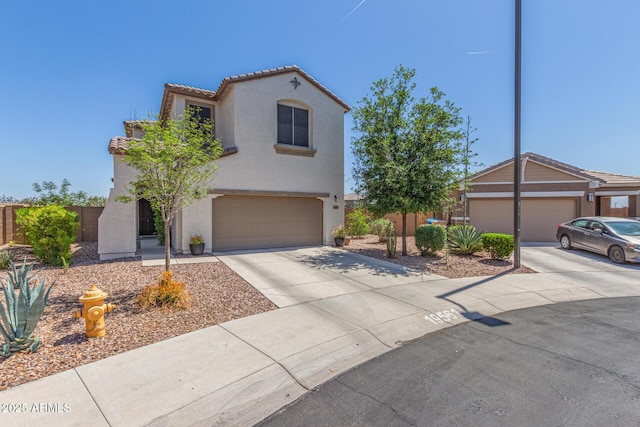 19561 W Woodlands Ave, Buckeye, AZ 85326 - mediterranean / spanish-style house with driveway, stucco siding, and a tile roof