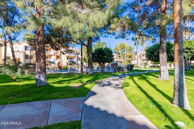 view of home's community featuring a lawn