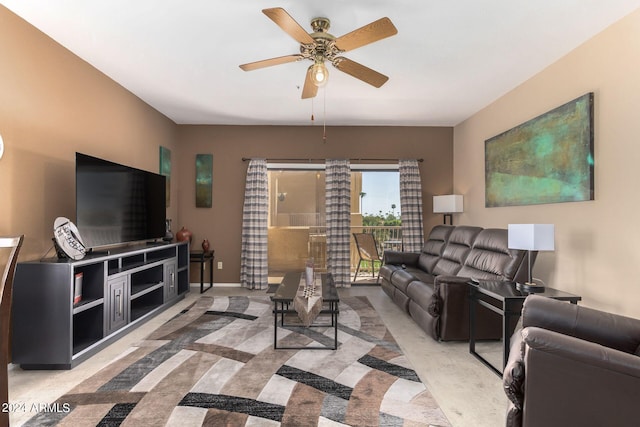 carpeted living room featuring ceiling fan