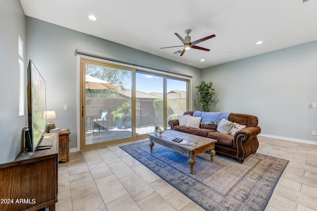 living room featuring ceiling fan