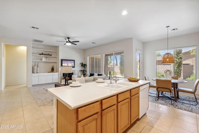 35402 N 32nd Dr, Phoenix, AZ 85086 - kitchen featuring dishwasher, light tile patterned flooring, light countertops, ceiling fan, and built in features
