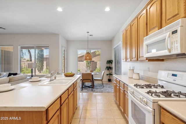 35402 N 32nd Dr, Phoenix, AZ 85086 - kitchen with white appliances, plenty of natural light, light countertops, and recessed lighting