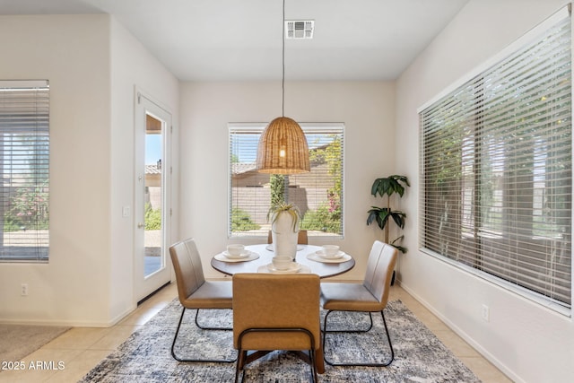 35402 N 32nd Dr, Phoenix, AZ 85086 - dining area with light tile patterned flooring and baseboards