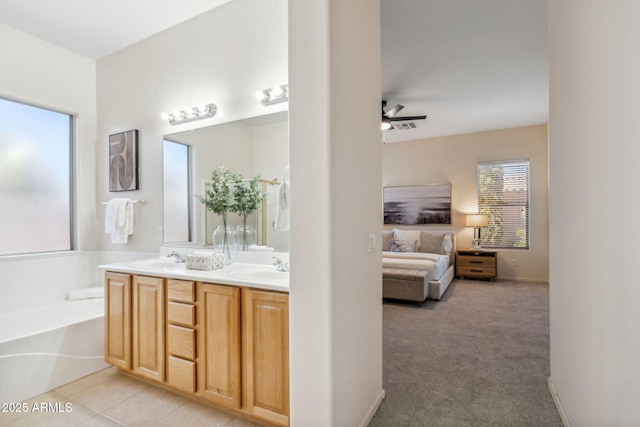 35402 N 32nd Dr, Phoenix, AZ 85086 - bathroom with double vanity, ceiling fan, a garden tub, and connected bathroom