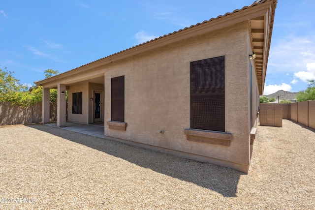 35402 N 32nd Dr, Phoenix, AZ 85086 - rear view of house with a fenced backyard, stucco siding, and a patio