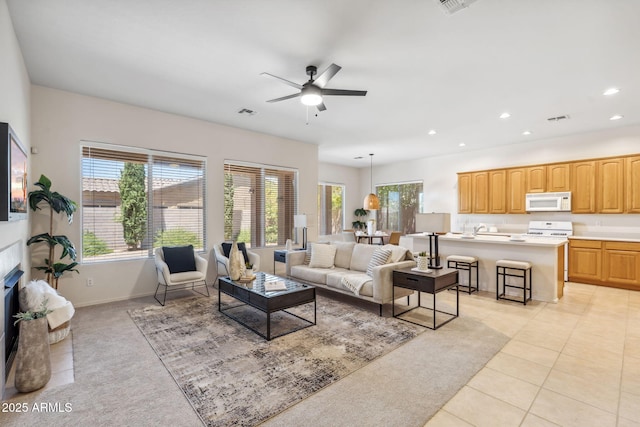 35402 N 32nd Dr, Phoenix, AZ 85086 - living room with plenty of natural light, ceiling fan, recessed lighting, and light colored carpet