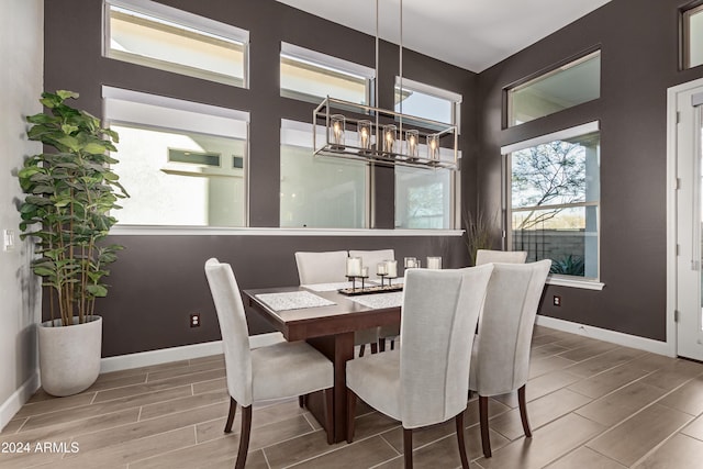 dining room featuring a chandelier and hardwood / wood-style flooring