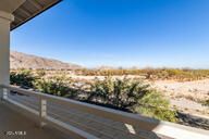 balcony featuring a mountain view