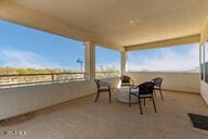 view of patio with a balcony