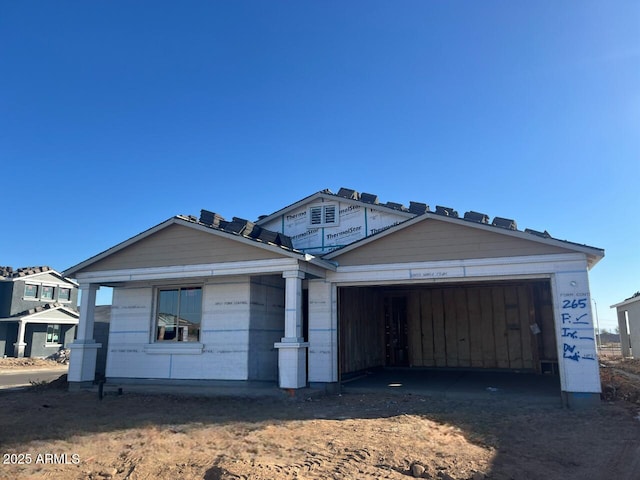 property in mid-construction featuring a garage