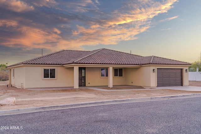 view of front of house with a garage