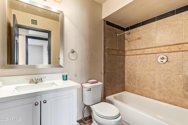 1302 E Forge Ave, Mesa, AZ 85204 - full bathroom featuring toilet, vanity, visible vents, and shower / bathing tub combination