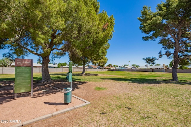 1302 E Forge Ave, Mesa, AZ 85204 - view of community featuring a lawn and fence