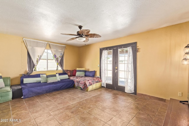 1302 E Forge Ave, Mesa, AZ 85204 - bedroom featuring ceiling fan, a textured ceiling, access to outside, and french doors