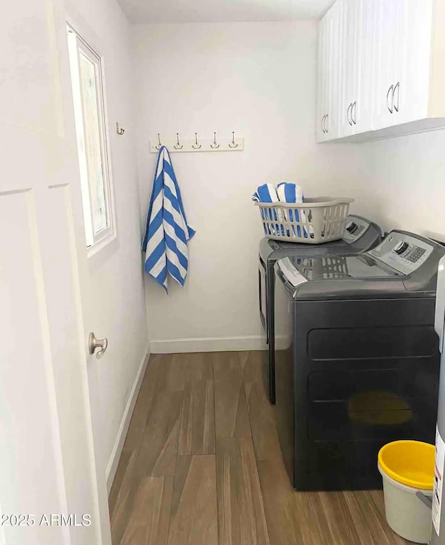 2100 N Normal Ave, Tempe, AZ 85288 - laundry area with washing machine and clothes dryer, cabinet space, and wood finished floors