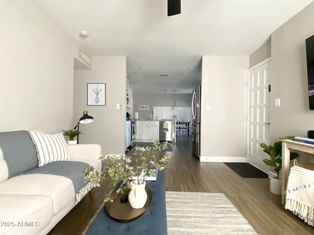 2100 N Normal Ave, Tempe, AZ 85288 - living area with dark wood-type flooring, ceiling fan, and recessed lighting