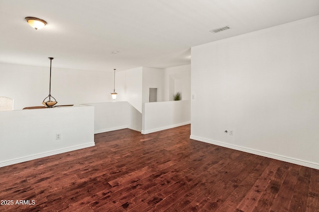 20809 N 1st Ave, Phoenix, AZ 85027 - empty room featuring dark wood-style floors and baseboards