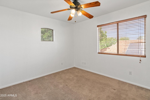20809 N 1st Ave, Phoenix, AZ 85027 - unfurnished room featuring light colored carpet, baseboards, and a ceiling fan
