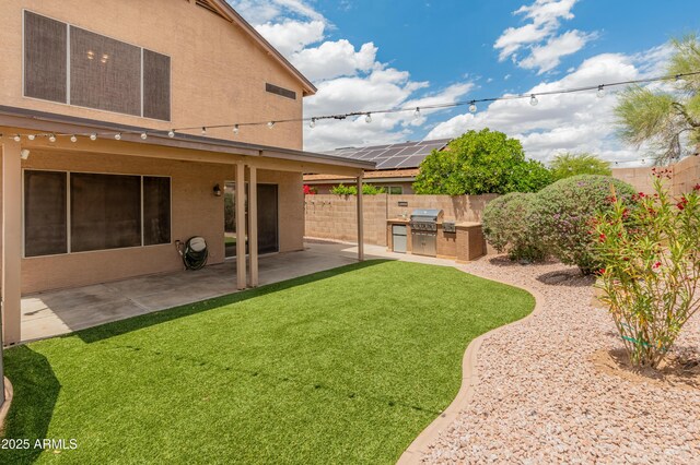 20809 N 1st Ave, Phoenix, AZ 85027 - view of yard featuring exterior kitchen and a patio