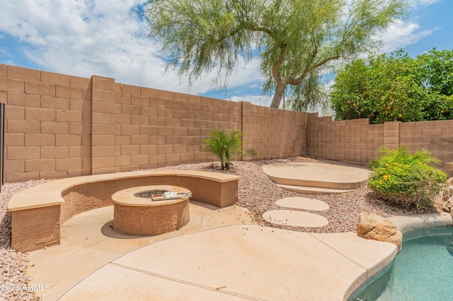 20809 N 1st Ave, Phoenix, AZ 85027 - view of patio featuring a fenced backyard and an outdoor fire pit