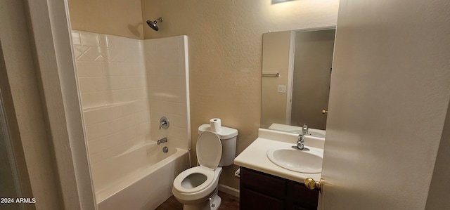 full bathroom featuring vanity,  shower combination, and toilet