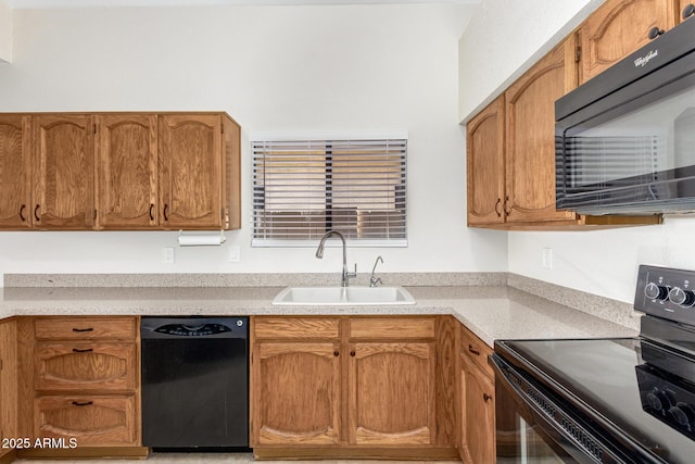 kitchen featuring black appliances and sink