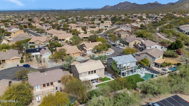 birds eye view of property featuring a mountain view and a residential view