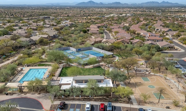 birds eye view of property with a residential view and a mountain view