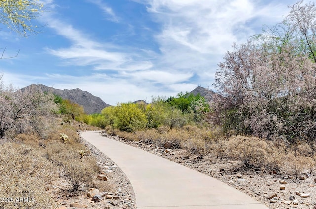 surrounding community featuring a mountain view