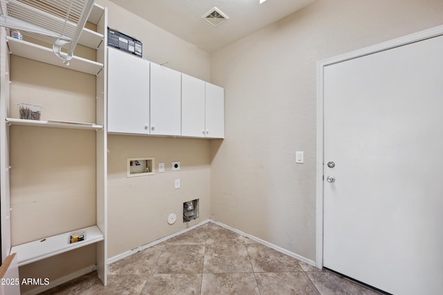 laundry area with visible vents, hookup for a gas dryer, cabinet space, hookup for an electric dryer, and hookup for a washing machine
