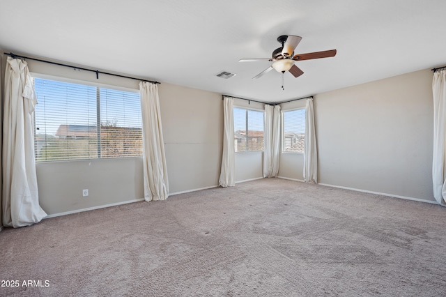 unfurnished bedroom with visible vents, ceiling fan, baseboards, and carpet floors