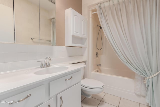 full bathroom featuring toilet, tile patterned flooring, shower / bath combination with curtain, vanity, and backsplash