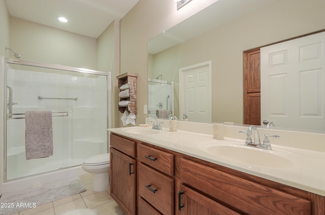 4975 W Gulch Dr, Eloy, AZ 85131 - full bath with tile patterned floors, double vanity, a sink, and a stall shower